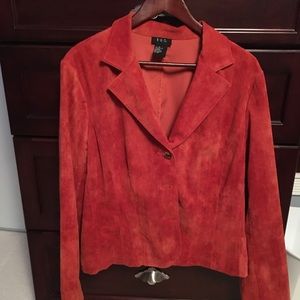 Rust/pumpkin color fine, soft tiny corduroy